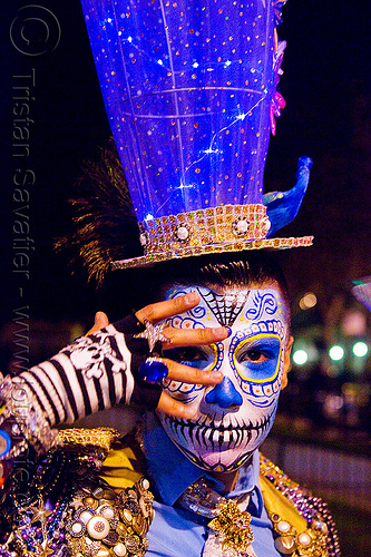 blue matador costume and carnival hat, blue hat, carnival hat, costume, day of the dead, dia de los muertos, face painting, facepaint, halloween, large hat, man, night, sugar skull makeup, suliman nawid