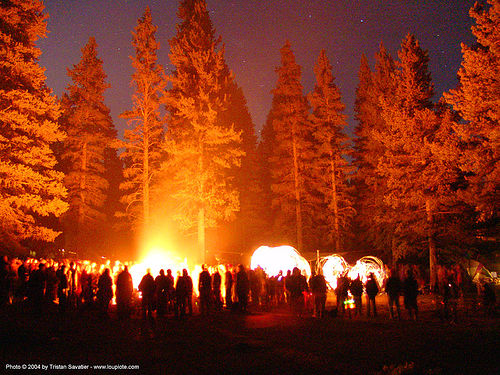 bonfire-and-fire-dancers - rainbow gathering - hippie, bonfire, crowd, fire dancers, fire spinners, forest, glowing, hippie, night, silhouettes, trees