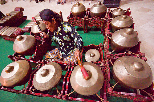 bossed gongs (java, indonesia), bossed gongs, gamelan ensemble, gong group, karawitan, man, music, musical, nipple gongs, orchestra, percussion, player, sitting