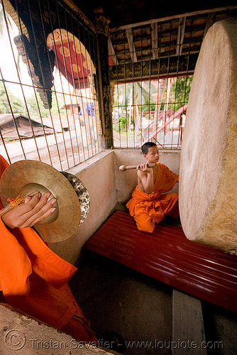 buddhist monk with big drum - luang prabang (laos), bhagwa, buddhism, buddhist monks, drum, luang prabang, monk, orange, saffron color