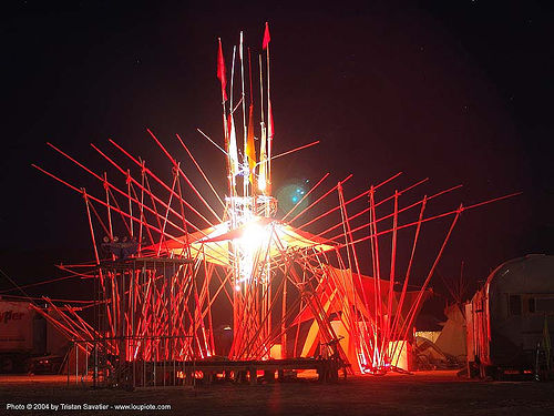 burning man - bamboo trapezium by gerard minakawa, art installation, bamboo trapezium, burning man at night, gerard minakawa
