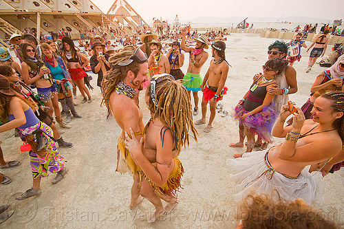 burning man - bride and groom dancing at their handfasting, bride, burning man temple, dancing, groom, handfasting, temple of whollyness, wedding
