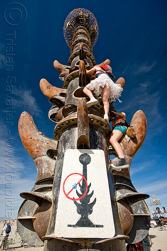 burning man - climbing the tower, art installation, bryan tedrick, climbers, climbing, danger, fall, man, sign, the minaret, tower, warning, woman