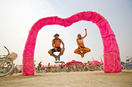 burning man - couple jumping under the pink heart, jump, jumpshot, man, pink heart camp, woman
