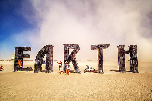 burning man - earth giant letters sculpture, @earth #home, art installation, big words, metal sculpture, steel