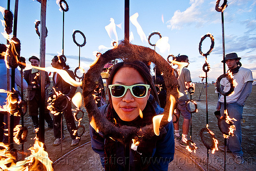 burning man - nucleus fire installation, dusk, fire, grace liew, rings, sculpture, sunglasses, woman