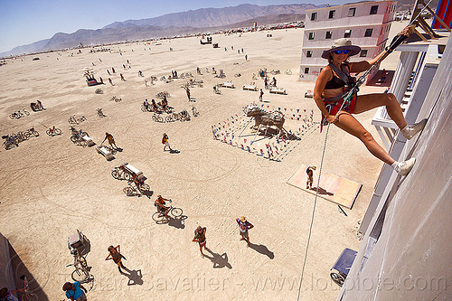 burning man - rappelling down wall street, abseiling, buildings, climbing harness, rappelling, rock climbing, single rope, static rope, vertical, wall street, woman