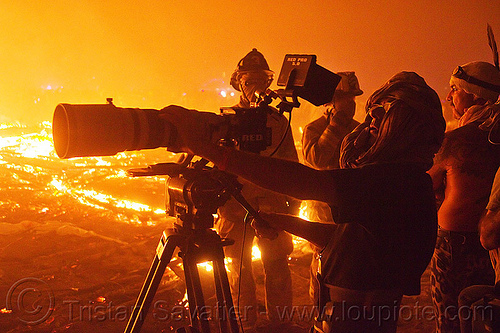 burning man - video crew filming the burn, burning man at night, camera operator, filming, fire, men, night of the burn, shooting, telephoto lens, tripod, video camera