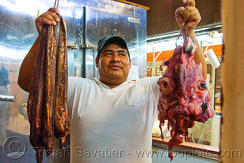 butcher with beef head, argentina, beef, butcher, cow head, man, meat market, meat shop, mercado central, noroeste argentino, raw meat, salta