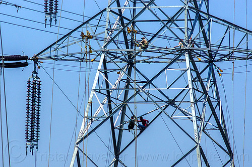 cable riggers installing power lines on transmission tower (india), cable riggers, cables, construction, electric line, electricity pylons, electricity transmission towers, high voltage, men, power line, power transmission lines, pulleys, pylon, rigging, safety harness, wires, workers, working