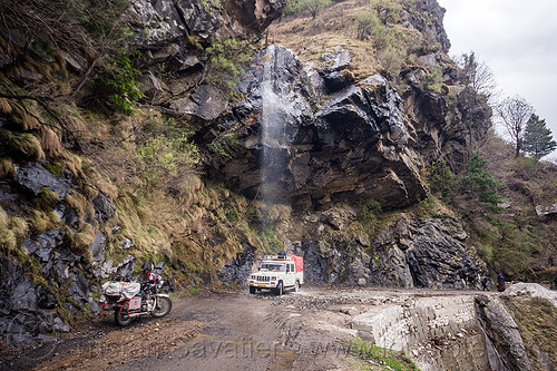 car gets shower from waterfall - gangotri road (india), 4x4, bhagirathi valley, car, dripping, jeep, motorcycle, mountain road, mountains, overhanging rock, shower, waterfall