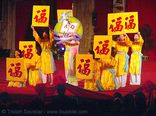 celebration in front of the cathedral - vietnam, cathedral, chinese, church, hanoi, ideograms, red, signs, yellow