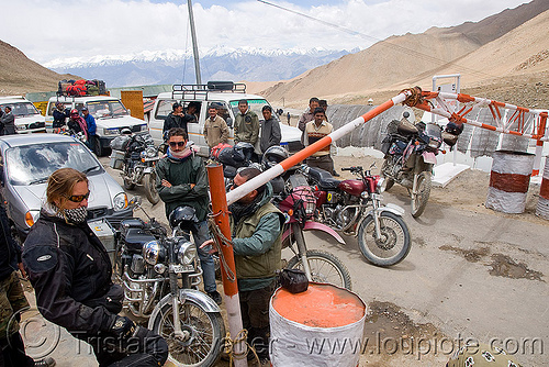 check-point - khardungla pass - ladakh (india), check-point, dual-sport, fence, kawasaki, khardung la pass, klr 650, ladakh, motorcycle touring, mountain pass, road, royal enfield bullet