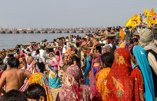 clay shiva linga's offering ceremony - kumbh mela (india), carrying on the head, clay, crowd, ganga, ganges river, hindu ceremony, hindu pilgrimage, hinduism, kumbh mela, lingams, offerings, river bank, shiva linga, shiva lingam, shivling, trays, walking