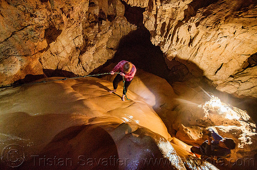 climbing a flowstone - sumaguing cave - sagada (philippines), cave formations, cavers, caving, climbing, concretions, flowstone, knotted rope, natural cave, sagada, speleothems, spelunkers, spelunking, sumaguing cave