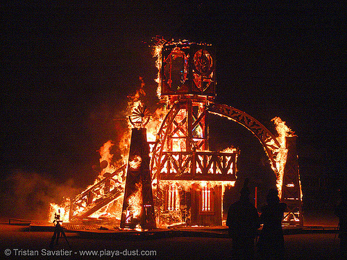 clockworks by liam mcnamara and crew - burning man 2005, burning man at night, clock tower, clockworks, fire