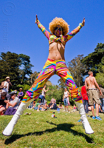 colorful woman jumping, afro hair, bay to breakers, footrace, golden gate park, jump, jumpshot, lawn, long legs, spread eagle, street party, woman