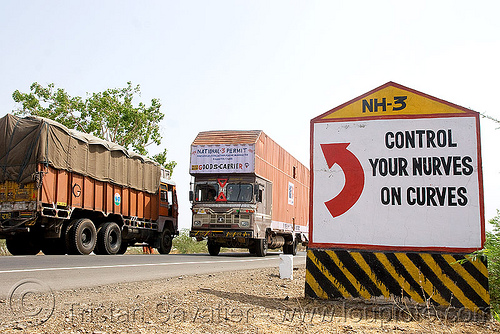 control your nurves on curves (sic!) - road sign (india), curves, highway, lorry, nerves, nh-3, nurves, red arrow, road marker, road sign, traffic, trucks, turn