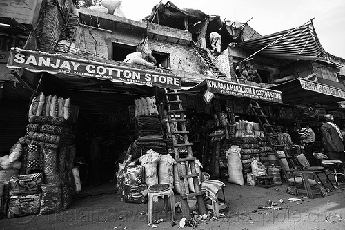 cotton stores in paharganj (delhi, india), building, cotton stores, delhi, dilapidated, handloom store, khurana handloom & cotton store, ladders, paharganj, sanjay cotton store, shops