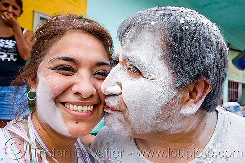 couple covered with white talk powder - carnaval - carnival in jujuy capital (argentina), andean carnival, argentina, carnaval de la quebrada, jujuy capital, kiss, kissing, man, noroeste argentino, san salvador de jujuy, talk powder, white, woman