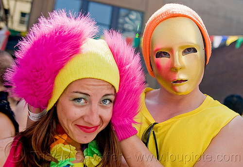 couple in yellow and pink party costumes - how weird festival (san francisco), clothing, fashion, fuzzy gloves, golden mask, kandi kid, kandi raver, man, pink, woman, yellow