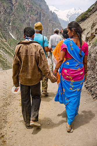 couple on trail - pilgrims - amarnath yatra (pilgrimage) - kashmir, amarnath yatra, hindu pilgrimage, kashmir, mountain trail, mountains, pilgrims