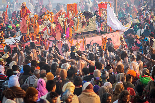 crowd of hindu devotees around guru's float - kumbh mela (india), crowd, float, hindu pilgrimage, hinduism, kumbh maha snan, kumbh mela, mauni amavasya, men, naga babas, naga sadhus, triveni sangam