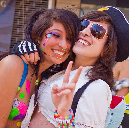 devin and jessica, color pasties, color polka dots, devin, jessica, kandi bracelet, lip piercing, peace sign, pirate costume, rainbow pasties, rainbow polka dots, v sign, victory sign, women