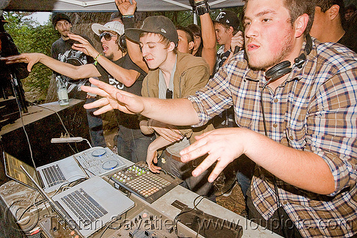 djs at underground rave party, audio mixers, deejays, dj equipment, dj mixers, djs, hands, laptops, men, party, raver, sound, turn tables