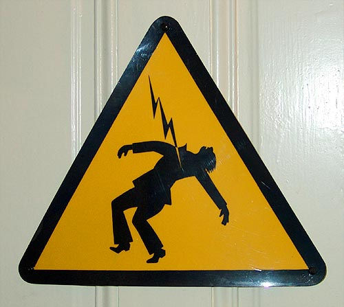 electrocuted - safety sign - high voltage - electricity hazard, danger, death, electric, electricity, electrocuted, electrocution, hazard, high voltage, lightning, man, safety sign, stick figure, stick figures in peril, triangle, triangular, yellow