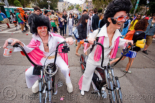 elvis impersonators on chopper bikes, bay to breakers, bicycles, costume, crowd, custom bikes, customized, elvis impersonators, elvis wigs, footrace, man, pink, street party, sunglasses, white, woman