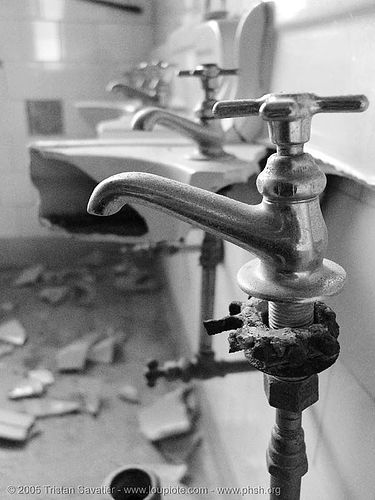 faucets in vandalized restroom, abandoned building, abandoned hospital, bathroom, faucets, presidio hospital, presidio landmark apartments, sinks, toilet, trespassing, vandalism, vandalized