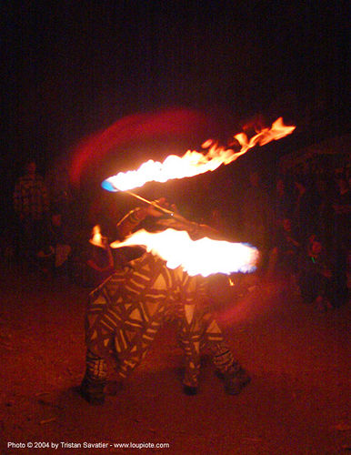 fire-dancer - rainbow gathering - hippie, fire dancer, fire dancing, fire performer, fire spinning, fire staff, hippie, night, spinning fire