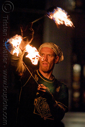 fire performer - temple of poi 2009 fire dancing expo - union square (san francisco), fire dancer, fire dancing expo, fire performer, fire poi, fire spinning, man, night, spinning fire, temple of poi