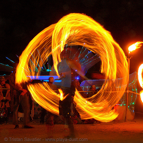 fire spinner - burning man 2006, burning man at night, fire dancer, fire dancing, fire performer, fire spinning, spinning fire