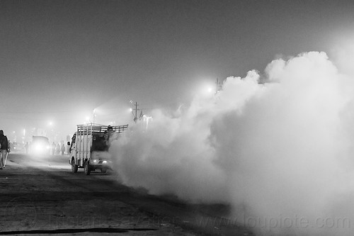 fogging truck spraying ddt insecticide at kumbh mela 2013 (india), air quality, ddt, environment, fog truck, fogger truck, fogging, hindu pilgrimage, hinduism, insecticide, kumbh mela, lorry, night, pollution, smog, spray, spraying, white smoke