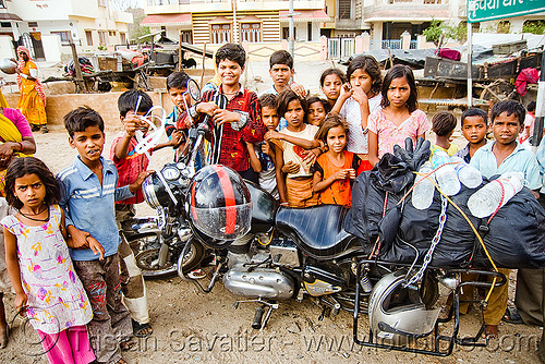 gadia lohars nomadic tribe kids around my "royal enfield" bullet 350cc motorcycle (india), 350cc, child, gadia lohars, gaduliya lohars, gipsies, gypsies, kid, motorcycle touring, nomadic tribe, nomads, road, royal enfield bullet, udaipur