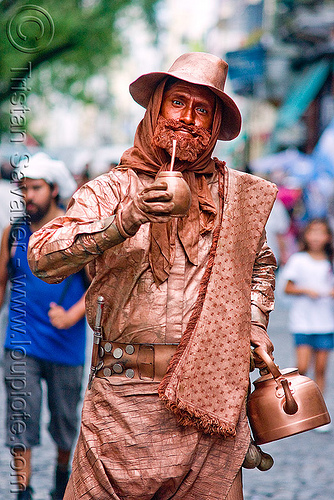gaucho in copper color - street performer (argentina), argentina, brass, buenos aires, gaucho, living statue, man, performer, porongo, san telmo, yerba mate