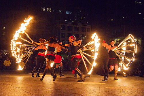 giant fire fans, fire dancer, fire dancing expo, fire fans, fire performer, fire spinning, night, solar flare, spinning fire, temple of poi