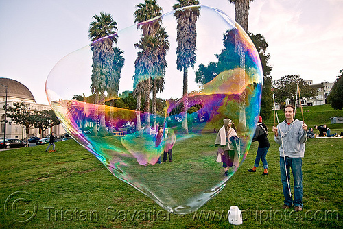 giant soap bubble in dolores park, big bubble, giant bubble, iridescent, lawn, park, soap bubbles