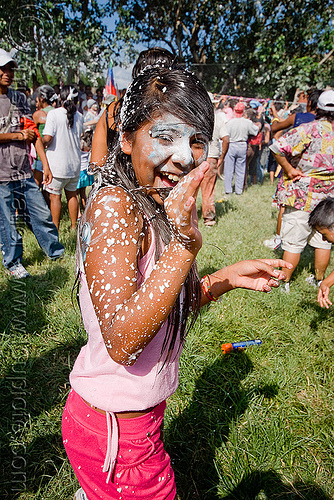 girl covered with party foam - carnaval - carnival in jujuy capital (argentina), andean carnival, argentina, carnaval de la quebrada, girl, jujuy capital, noroeste argentino, party foam, san salvador de jujuy, woman