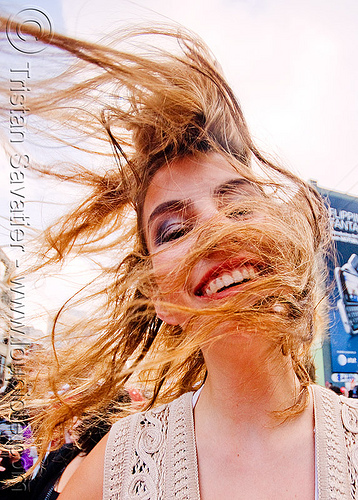 girl doing hair flip - how weird street faire (san francisco), hair flip, hait, long hair, windy, woman