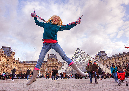 girl jumping at le louvre pyramid, blonde, clouds, crowd, jump shot, le louvre, pyramid, scarf, spread eagle, spread legs, tourists, woman