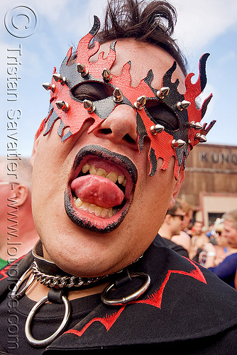 goth vampire - up your alley fair (san francisco), black lipstick, carnival mask, goth, gothic, man, red, sticking out tongue, sticking tongue out, vampire