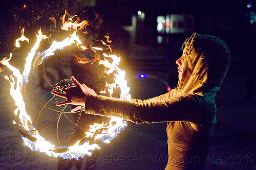 grace spinning fire fans, fire circle, fire dancer, fire dancing, fire fans, fire performer, fire spinning, grace hoops, hood, hoodie, hoody, night, ring, woman