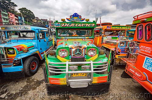 green jeepney on parking lot (philippines), baguio, colorful, decorated, front grill, jeepneys, painted, truck