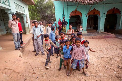 group of indian boys on village plaza, blue house, children, crowd, khoaja phool, kids, village, खोअजा फूल