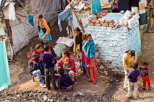 group of women and children in village (india), children, cloth lines, familly, gathering, kids, shanty house, shanty town, village, women