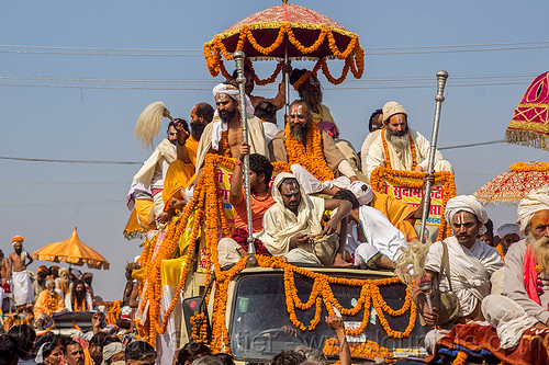 gurus and babas on parade float - kumbh mela (india), crowd, float, gurus, hindu pilgrimage, hinduism, kumbh maha snan, kumbh mela, mauni amavasya, parade, umbrella