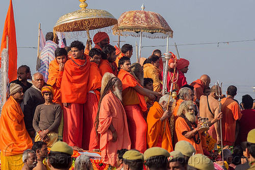 gurus and hindu devotees on parade float - kumbh mela (india), bhagwa, crowd, float, gurus, hindu pilgrimage, hinduism, kumbh maha snan, kumbh mela, mauni amavasya, parade, saffron color, umbrellas